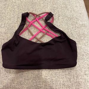 Lululemon sports bra. Burgundy with hot pink and maybe straps. Size 4